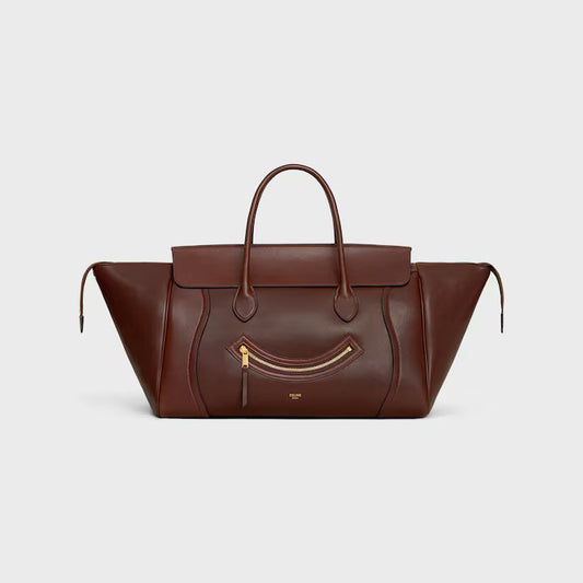 MEDIUM SMILING NEW LUGGAGE IN SUPPLE SHINY LAMBSKIN